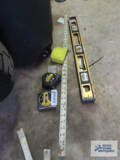 Aluminum level, straight edge, and measuring tapes
