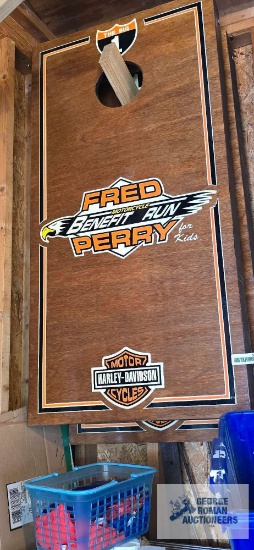 Fred Perry benefit run Harley-Davidson cornhole boards