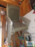 Four outdoor patio chairs