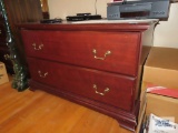 Cherry finish two drawer cabinet on second floor