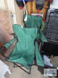 Two canvas folding chairs