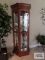Lighted Oak curio cabinet on first floor