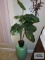 Ceramic plant stand with artificial plant