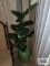 Ceramic plant stand with artificial plant