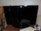 Toshiba 32 inch television model 32C110Uwith wood TV stand.