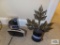 Earmuffs, digital alarm clock, and candle sconce