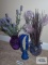 Decorative vases with florals and plastic filler pebbles