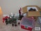 Decorative candle holders, bells, and large pine cones