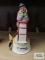 Emmett Kelly Jr, clown with purple coat leaning on stool music box, plays Send in the Clowns,