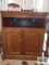 Oak flat screen TV stand on first floor.