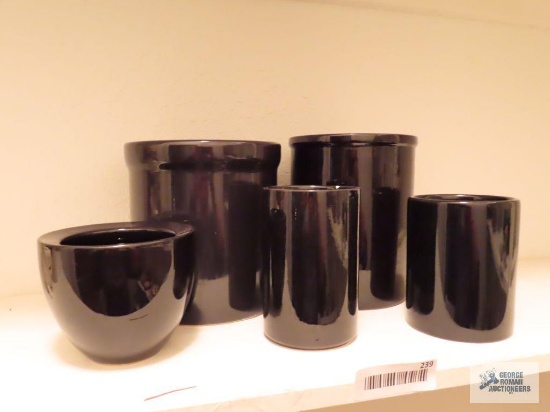 Black crocks and vase