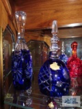 Two cobalt blue crystal hand cut bells, marked made in Hungary and West Germany.
