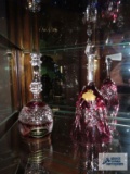 Cranberry glass hand cut crystal bells. One marked made in Western Germany