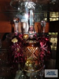 Two cranberry and one yellow hand cut crystal bells. Marked Poland and West Germany.