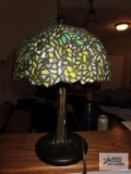 Tiffany style table lamp. 15-1/2 in tall. Shade measures 10-1/2 in wide.