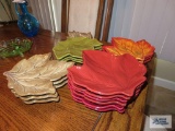 Variety of leaf plates and salt and pepper shakers.
