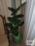 Ceramic plant stand with artificial plant