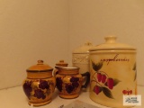 Casa Vero grape pattern creamer, sugar, salt and pepper shakers and other ceramic canisters.
