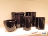 Black crocks and vase