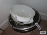 Stainless steel mixing bowl, other bowl, and colanders