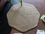 Tan octagon rug, approximately 4 ft