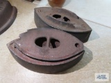 Cast iron antique irons. One is broken