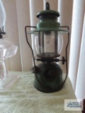 Antique green lantern with Pyrex shade