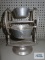Hammered aluminum and glass rotating condiment set