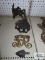 Antique oil lamp parts, 1949 Virginia Metalcrafters trivet, and miniature cast iron iron with stand