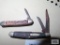 K-bar pocket knife and smaller pocket knife. Both are rusty.