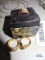 Gold colored ring with clear gemstones, marked 18 KT GE. Gold colored ring with small pear-shaped