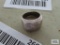 Silver colored solid band ring, marked 925.