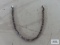 Silver colored bracelet, marked 925 Italy. Clasp needs repaired.