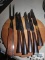E. Parker and Sons Sheffield England steak knives, The Master Carver fork, and apple cutting board