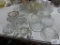 Large variety of clear glass bowls and mugs
