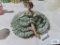 Handmade ceramic figurine marked MC. bottom is cracked.