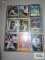 Baseball cards and Lion King cards, including Michael Jordan baseball cards in plastic sleeves