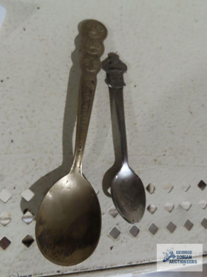 Rolex Lucerne collectors spoon and Spaghetti Os advertising spoon. Both are silverplate.