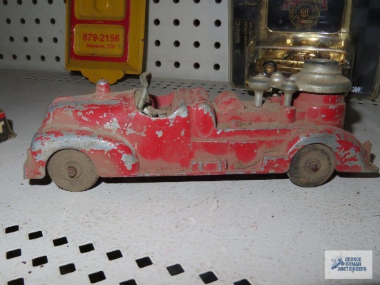 Antique metal fire truck with rubber wheels