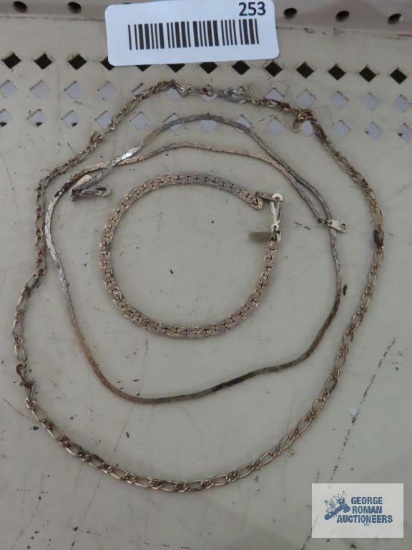 Bracelet and two necklaces, marked 14KGP.