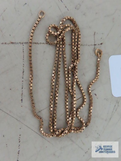 Gold colored necklace, no clasp, marked 750.