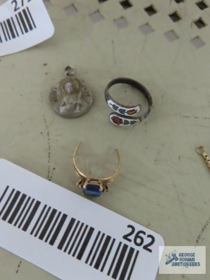 Saint Jude pendant, marked Creed. Spoon like enamel ring, has marking. Gold colored ring with blue