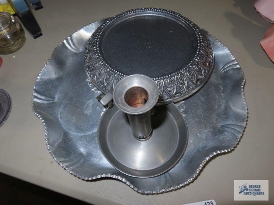 Aluminum serving platter, metal candlestick, and decorative candle holder