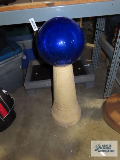 Blue gazing ball on base
