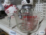 Pyrex measuring cup and cheese shaker