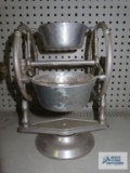 Hammered aluminum and glass rotating condiment set