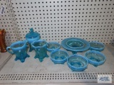 Frosted blue glass condiment dishes, candy dish, creamer and sugar, and covered candy dish. one of