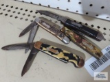 Four vintage pocket knives. All are rusty.