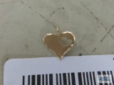 Gold colored heart shape pendant, marked 14K.