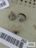 Saint Jude pendant, marked Creed. Spoon like enamel ring, has marking. Gold colored ring with blue